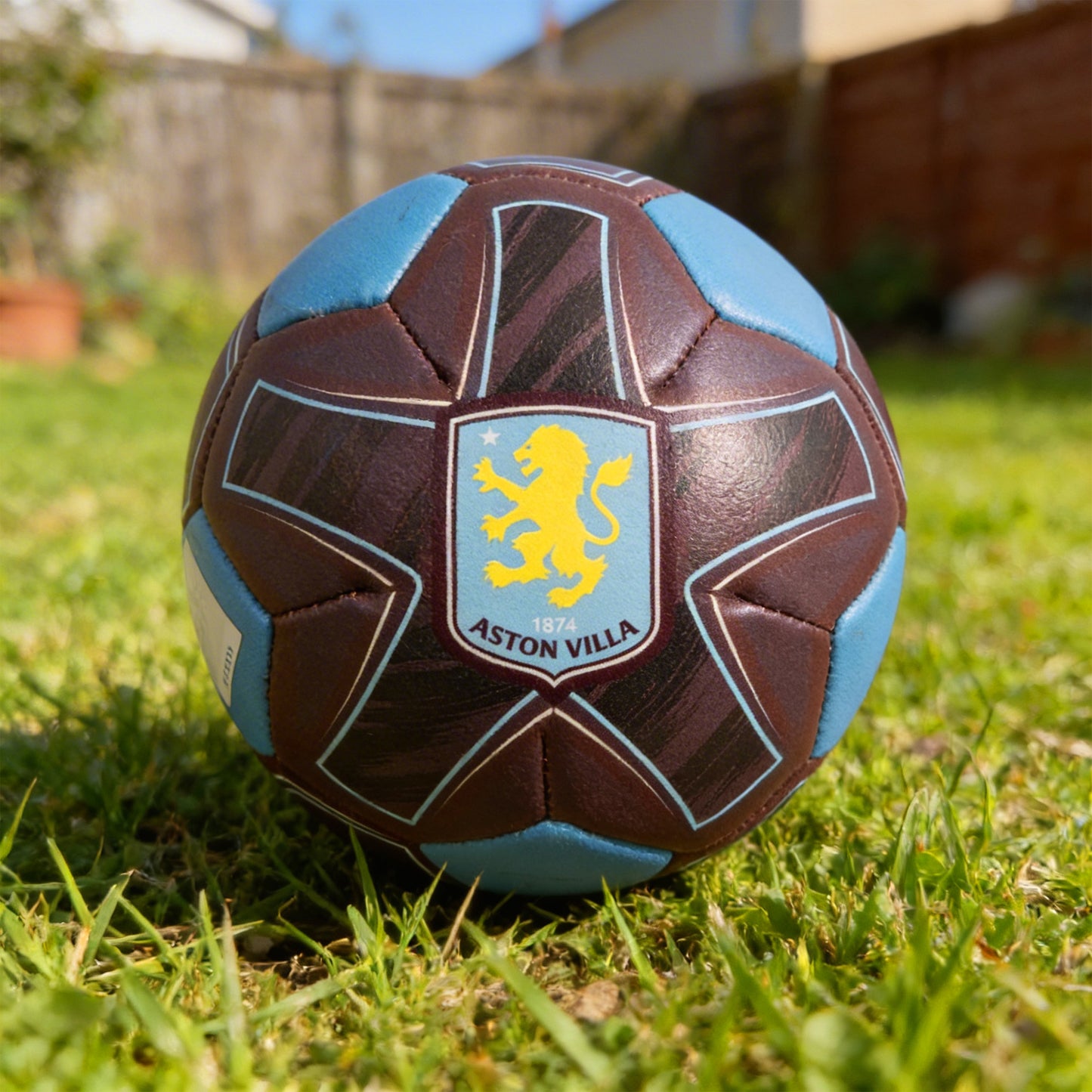 Official Aston Villa 4 inch soft ball with club crest on grass in a back garden