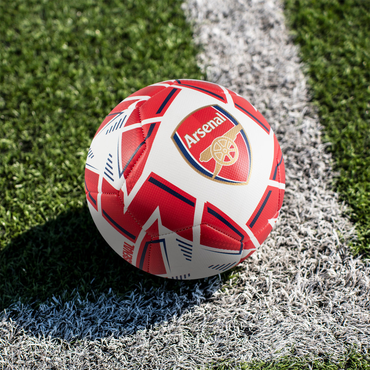 Arsenal Size 5 Nova Premium Football on a grass football pitch