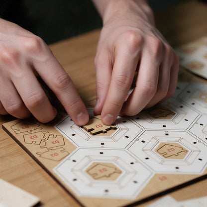 Close up of hands putting together the made by mind wooden construction