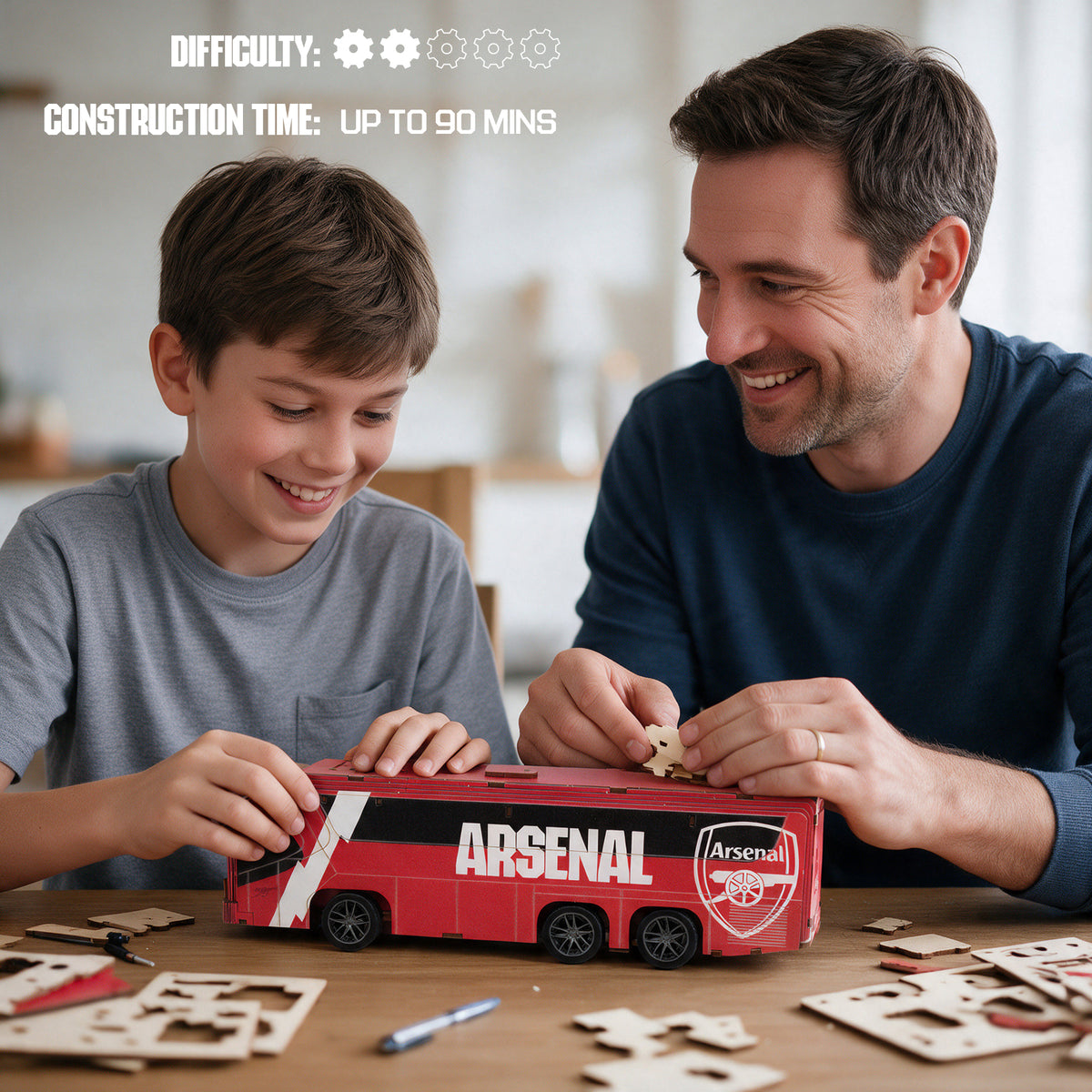 Farther and Son building the ARSENAL Made by Mind team bus together 