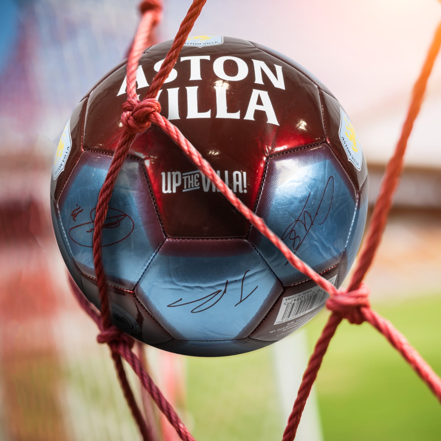 Officially licensed Aston Villa size 5 football hitting a football net