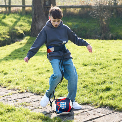 Officially licensed England kick trainer with 3 lions crest being used by young boy
