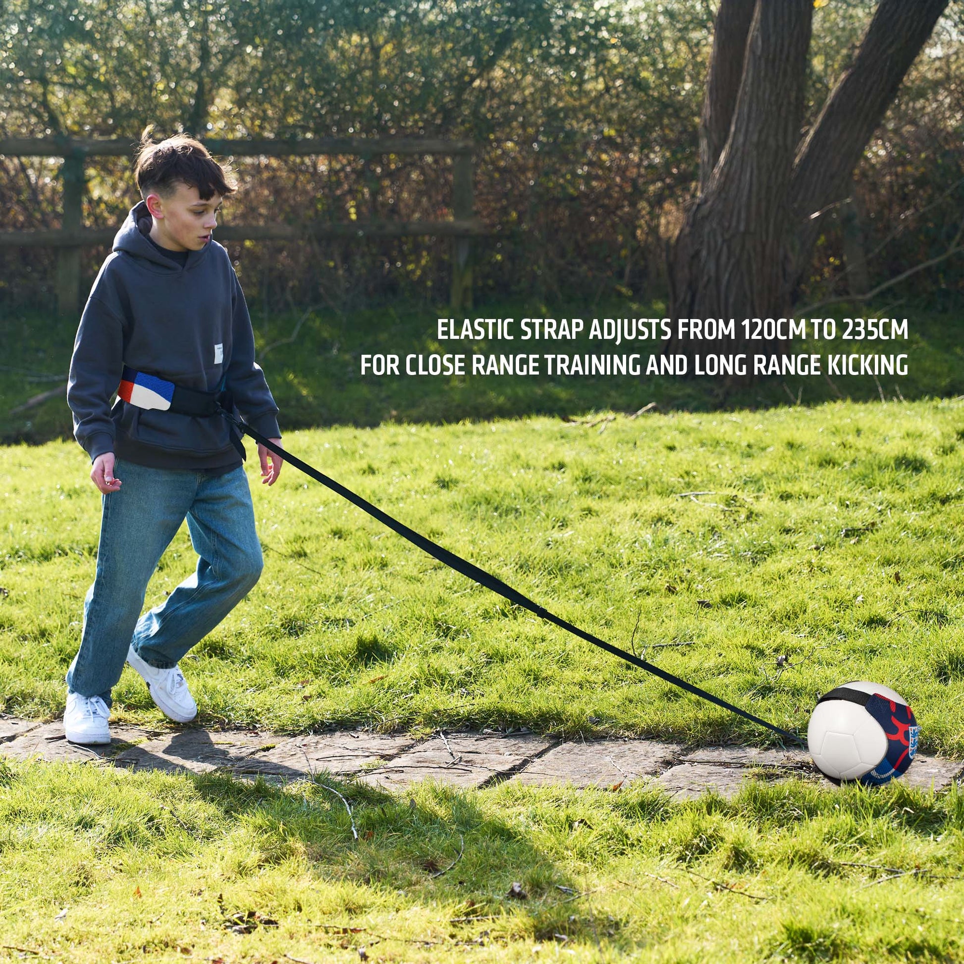 Officially licensed England kick trainer being used by a young boy outside.