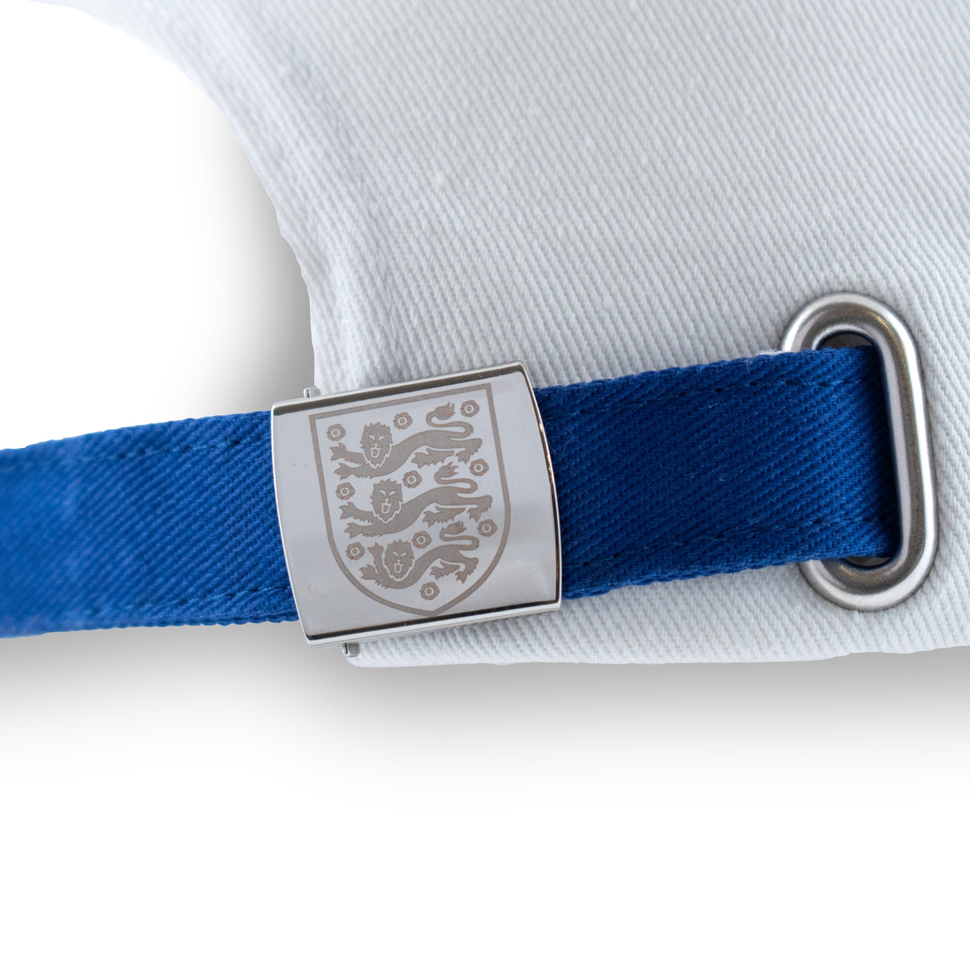 Close up of 3 lions branding on Officially licensed England cap in blue and white by Hy-Pro Sports on a white background