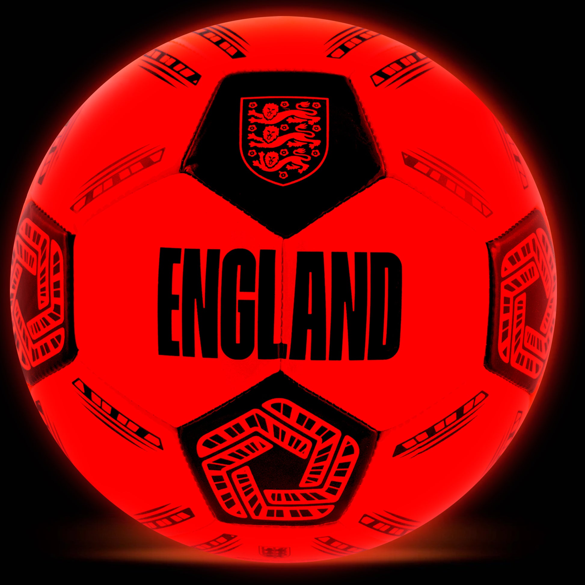 Officially licensed England FA football in neon orange glow in the dark design by hy-pro sports glowing on a black background