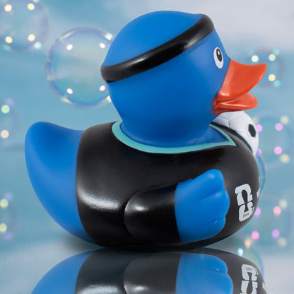 SIDE VIEW OF OFFICIAL FIFA WORLD CUP 2026 RUBBER DUCK BY HY-PRO SPORTS ON A BLUE BUBBLE BACKGROUND