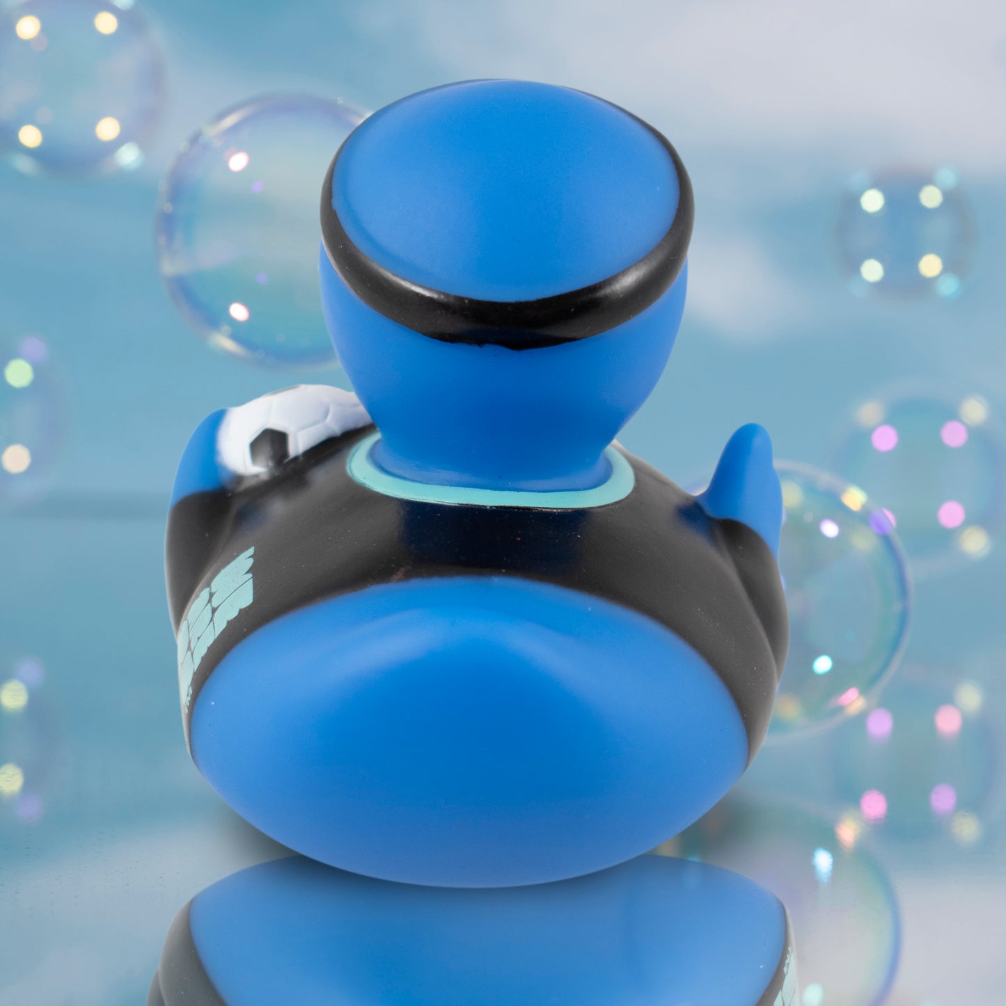 BACK OF OFFICIALLY LICENSED FIFA WORLD CUP 2026 RUBBER DUCK BY HY-PRO SPORTS ON A BLUE BUBBLE BACKGROUND