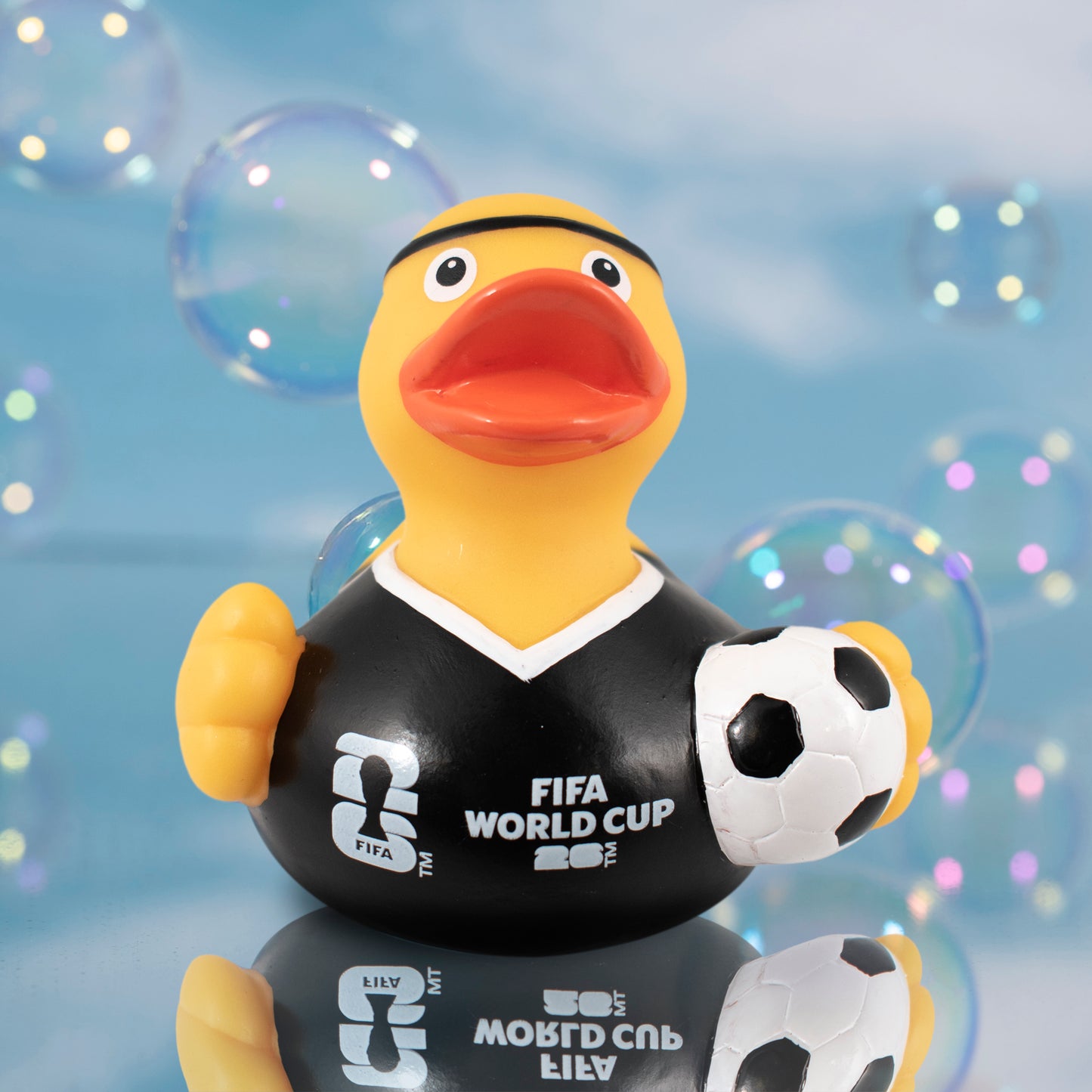 OFFICIALLY LICENSED FIFA WORLD CUP 2026 RUBBER DUCK BY HY-PRO SPORTS IN YELLOW ON BLUE BUBBLE BACGROUND