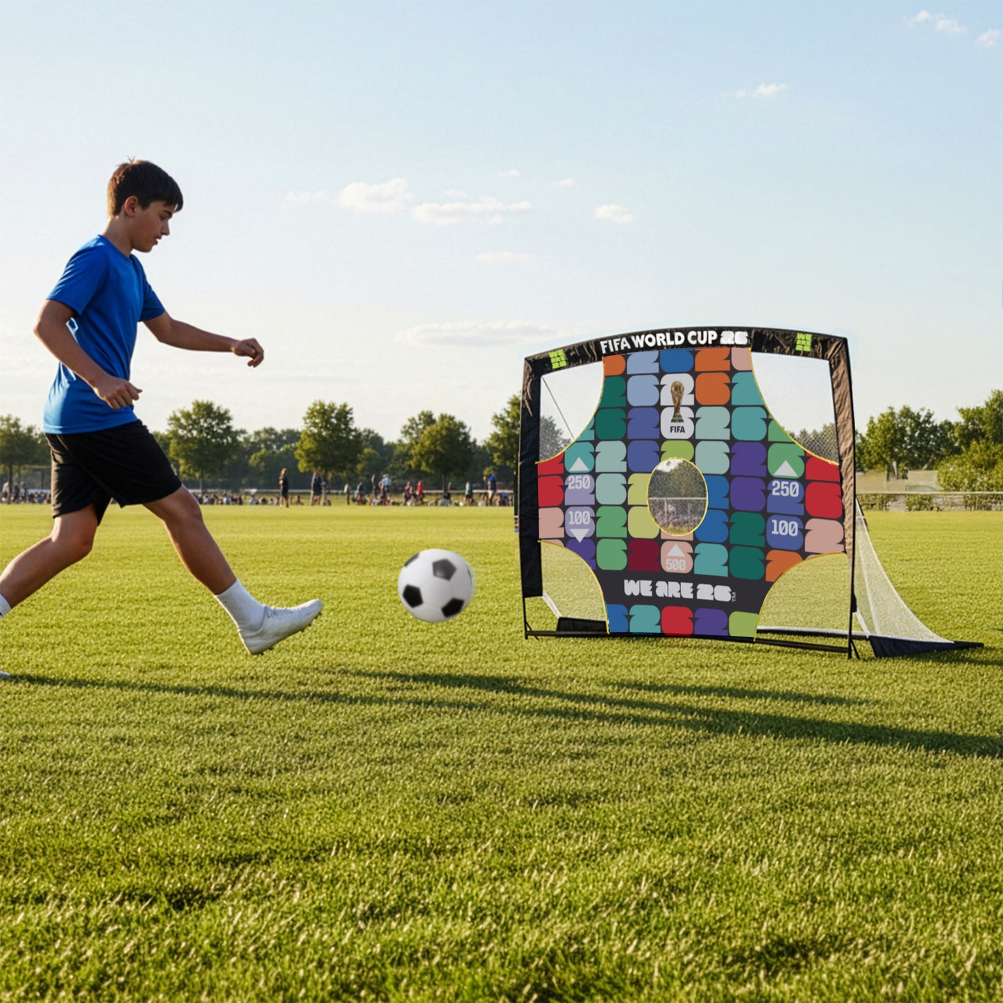 FIFA WORLD CUP 2026 4FT X 3FT FLEXI TARGET GOAL BEING USED IN A FIELD BY A FOOTBALL PLAYER 
