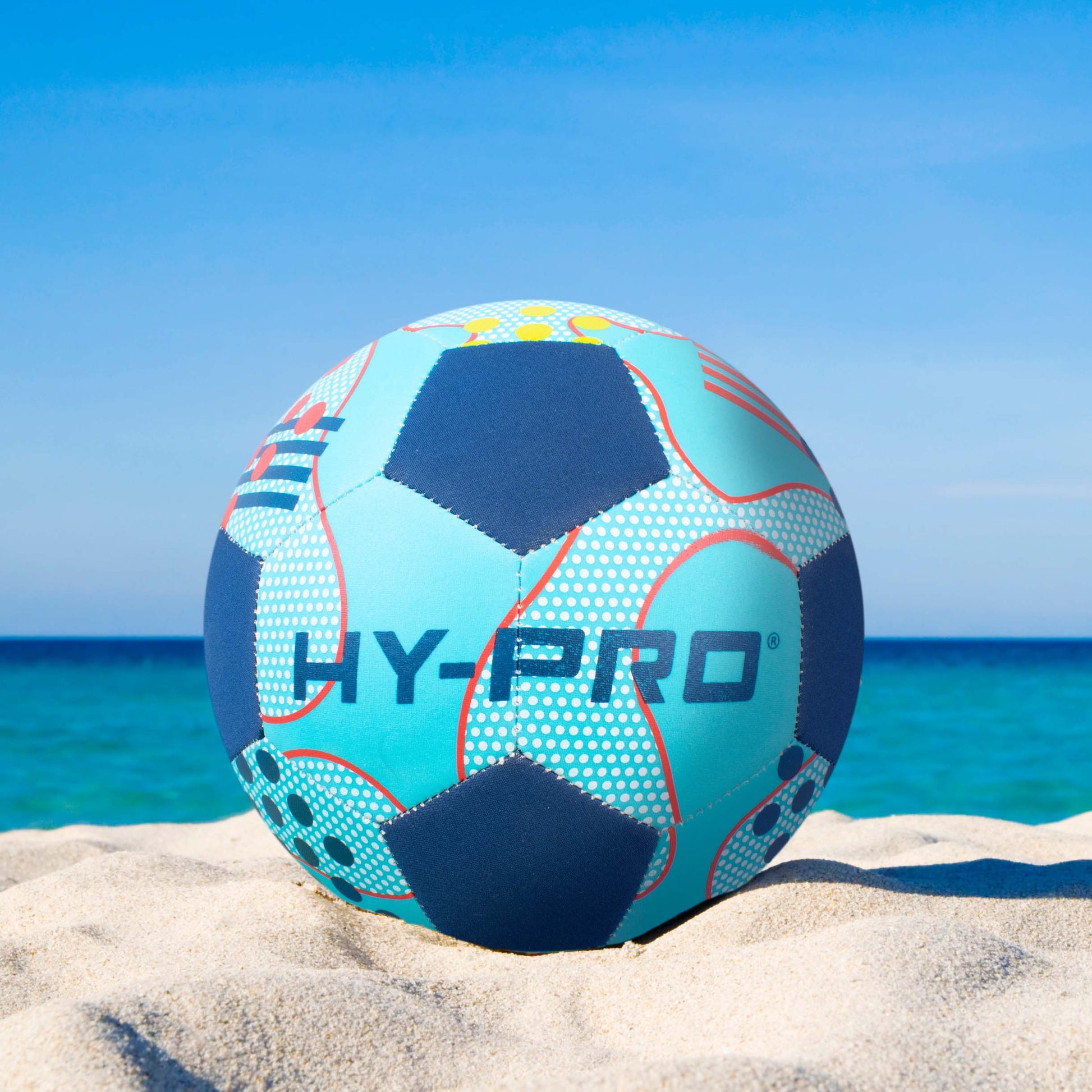 Hy-Pro size 5 Neoprene Football in blue on a sandy beach