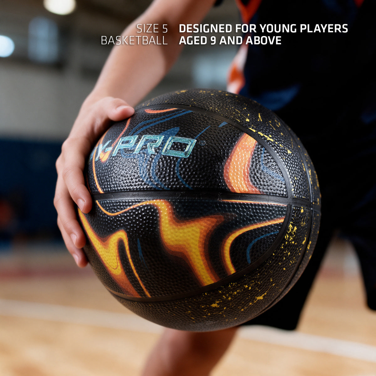 Hy-Pro size 5 basketball in orbit design being dribbled across a basketball court