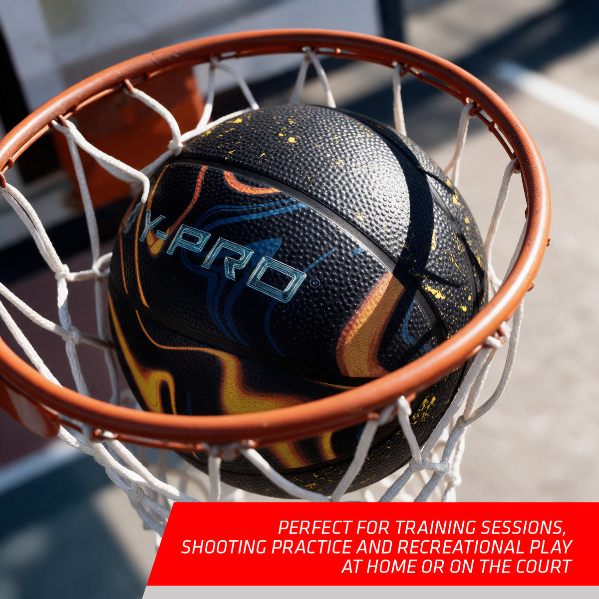 Hy-Pro size 5 orbit basketball in black with paint splatter design in a basketball net with a red feature reading 'Perfect for training sessions, shooting practice and recreational lay at home or on the court'