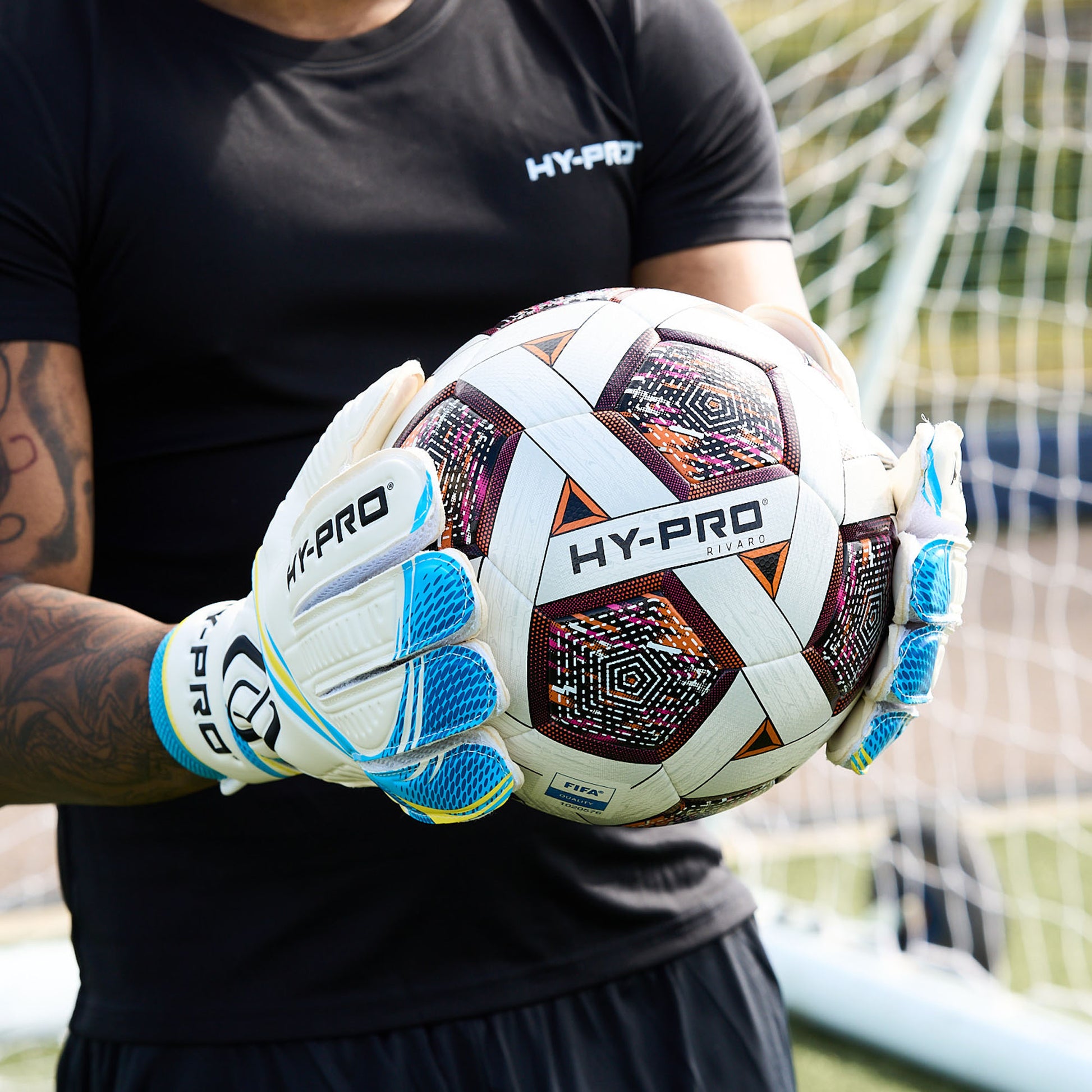Hy-Pro Official FIFA Quality Approved, Match, Size 5 Football ball being held in a goal keepers hands