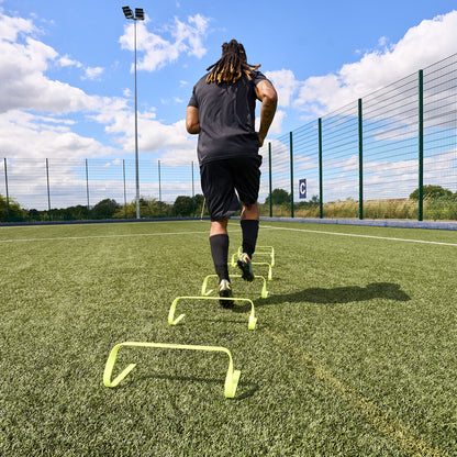 Hy-Pro Sports Yellow Agility Hurdles being used on a football pitch