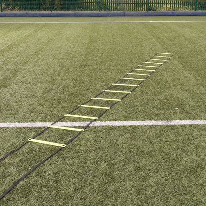 Hy-Pro Sports yellow agility ladder laid out on an Astroturf football pitch