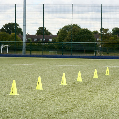 Hy-Pro sports cones lines up on a football pitch ready for a training session